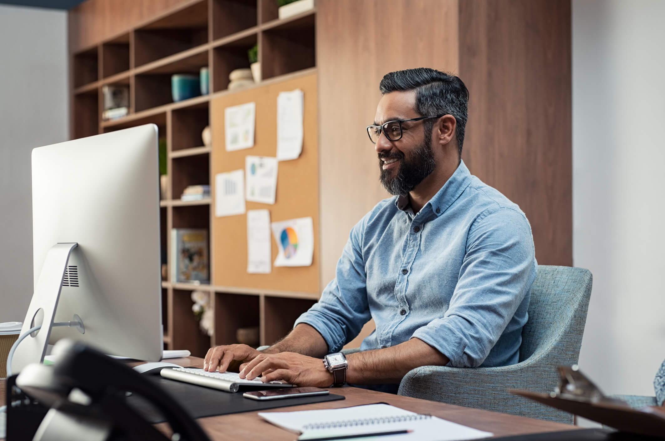 creative man working on computer