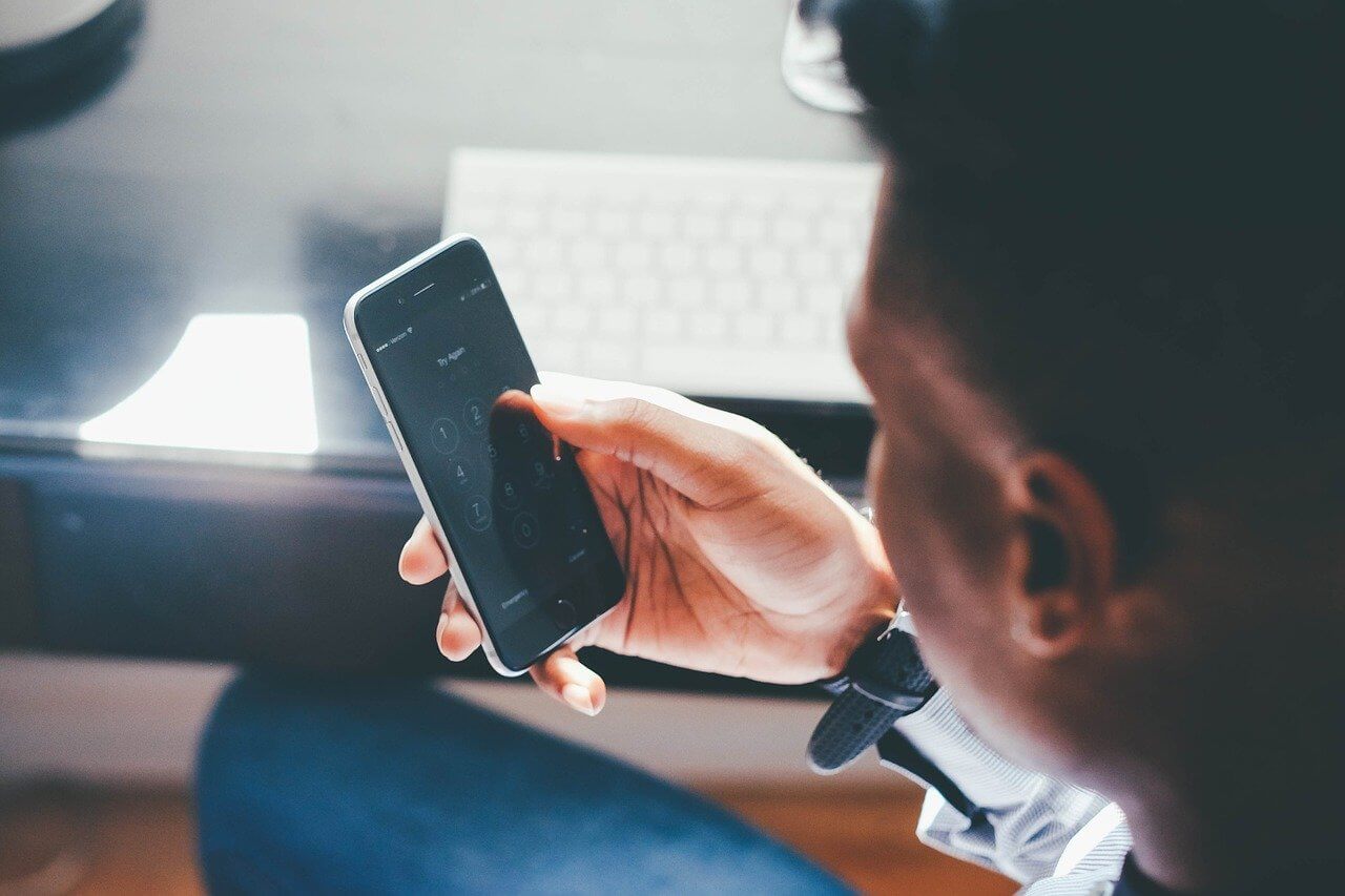 man using smartphone