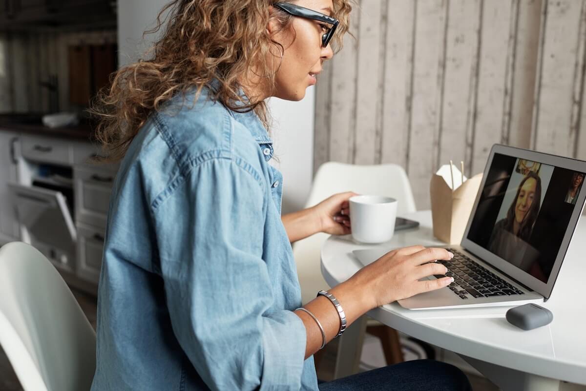 woman-in-blue-denim-jacket-using-macbook-pro-4099099 2