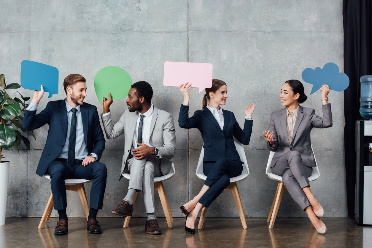 people holding speech bubbles