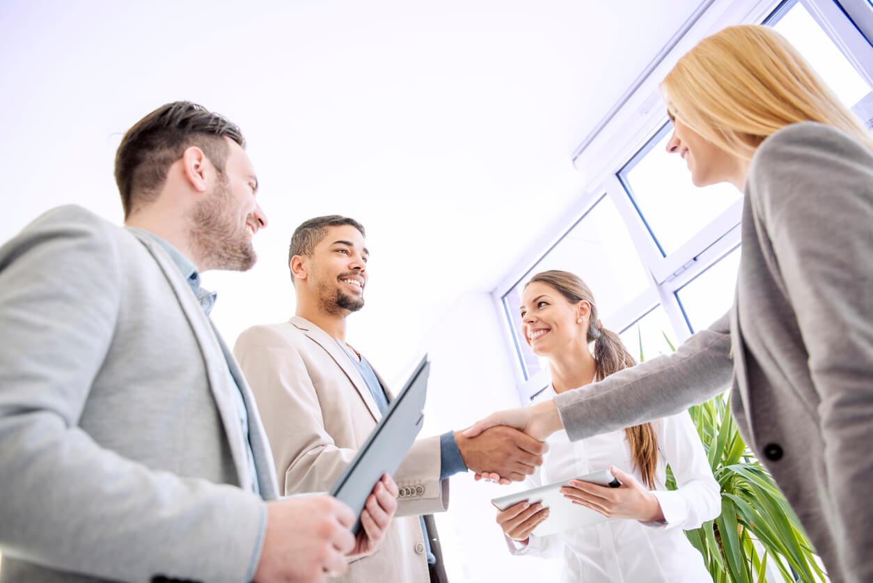 Two business executives shaking hands