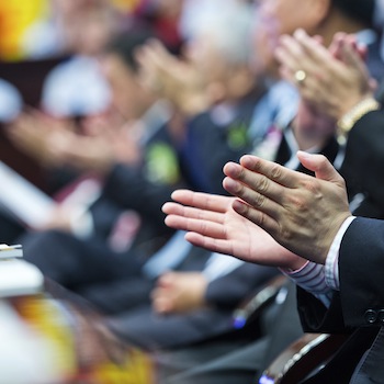 Business people hands applauding at meeting