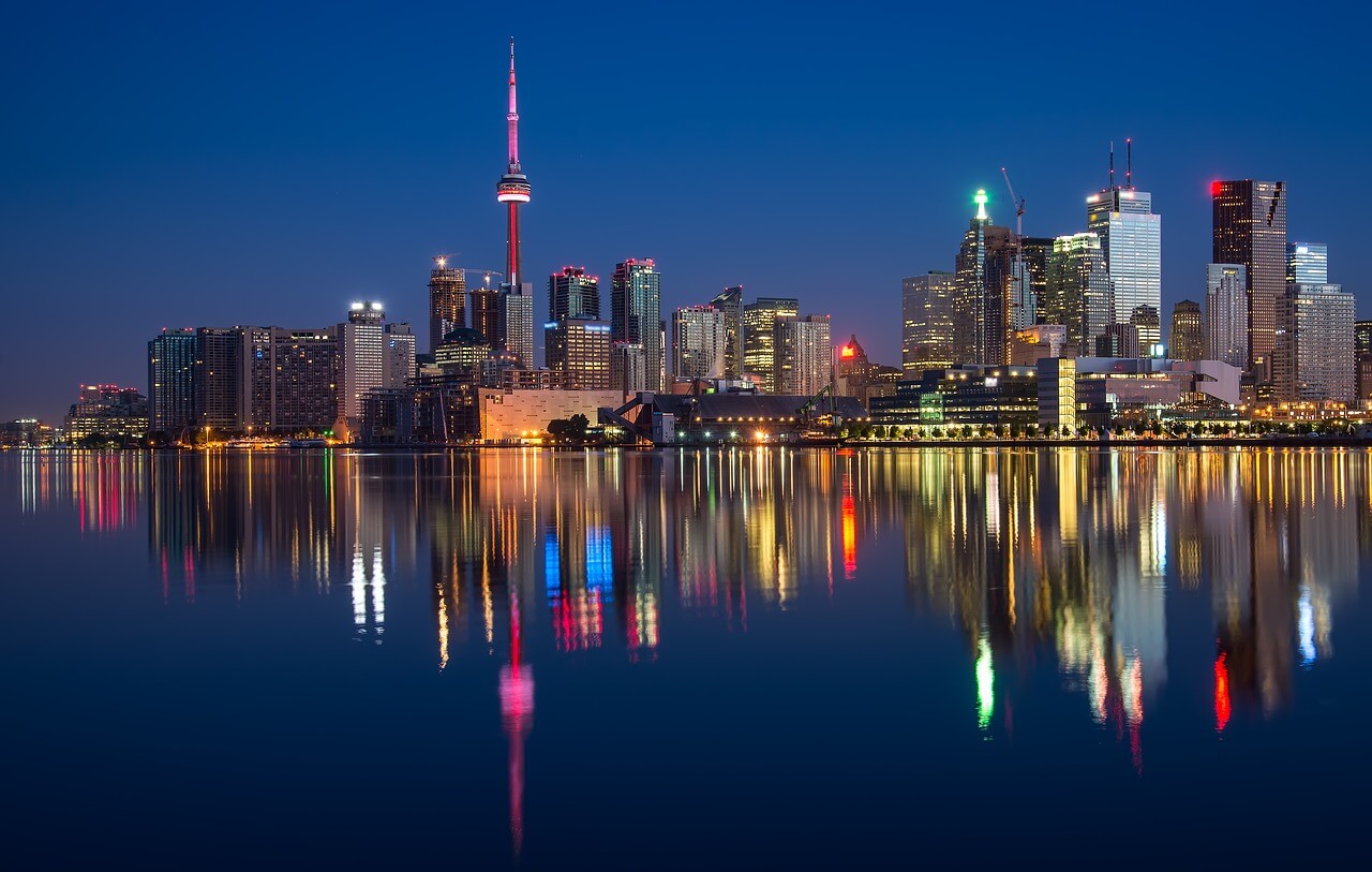 toronto skyline with reflection over water
