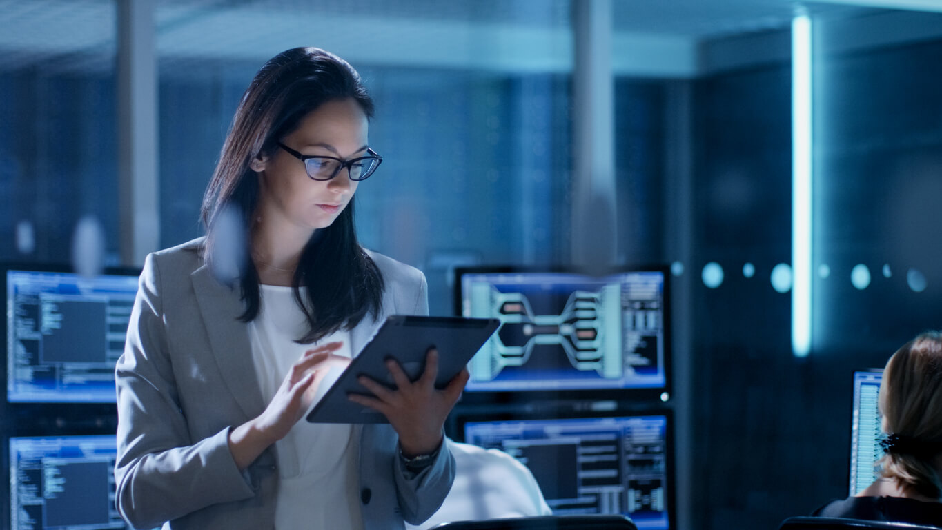 employee using tablet in data center