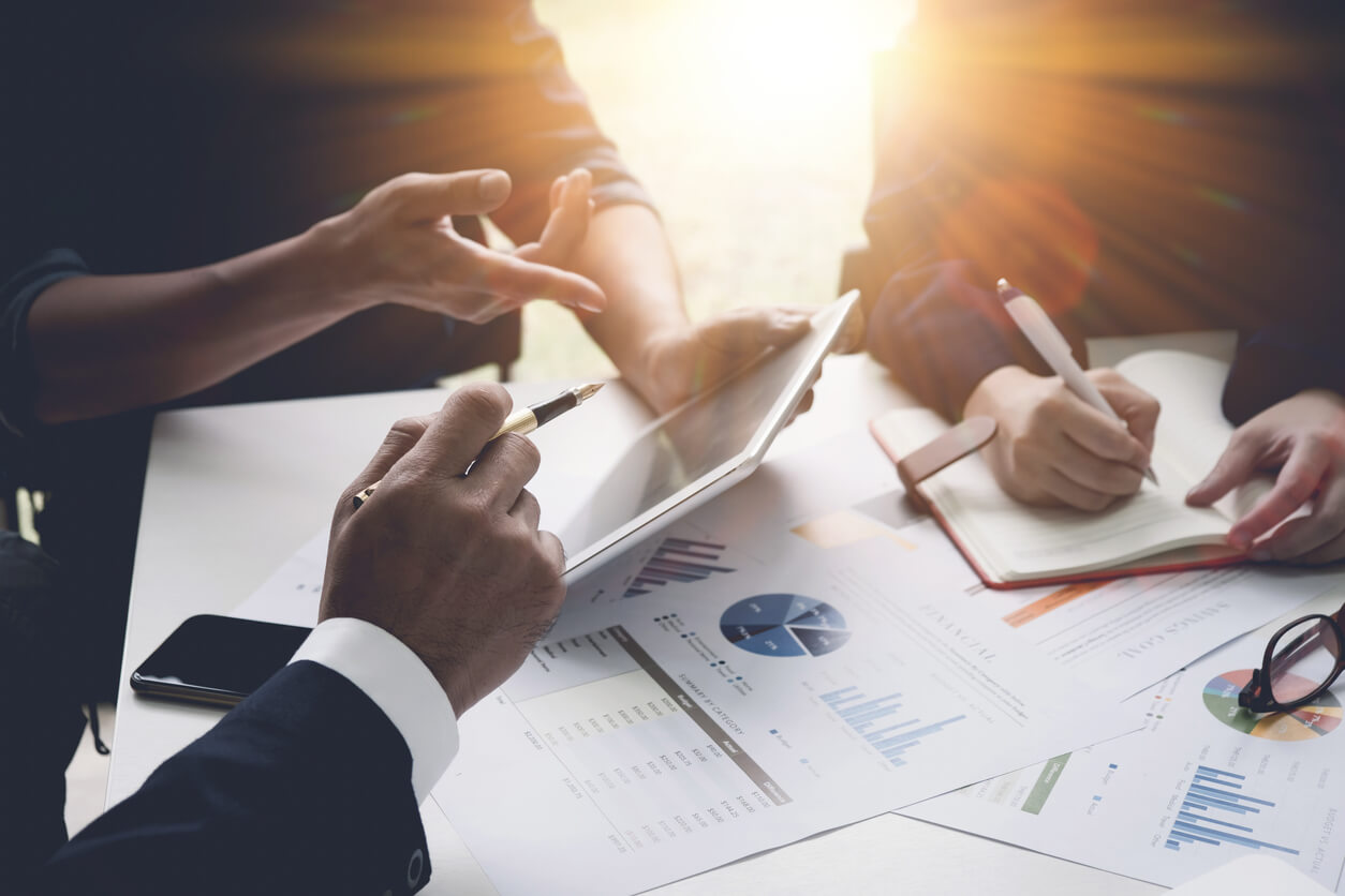 group of business people busy discussing financial matter during meeting