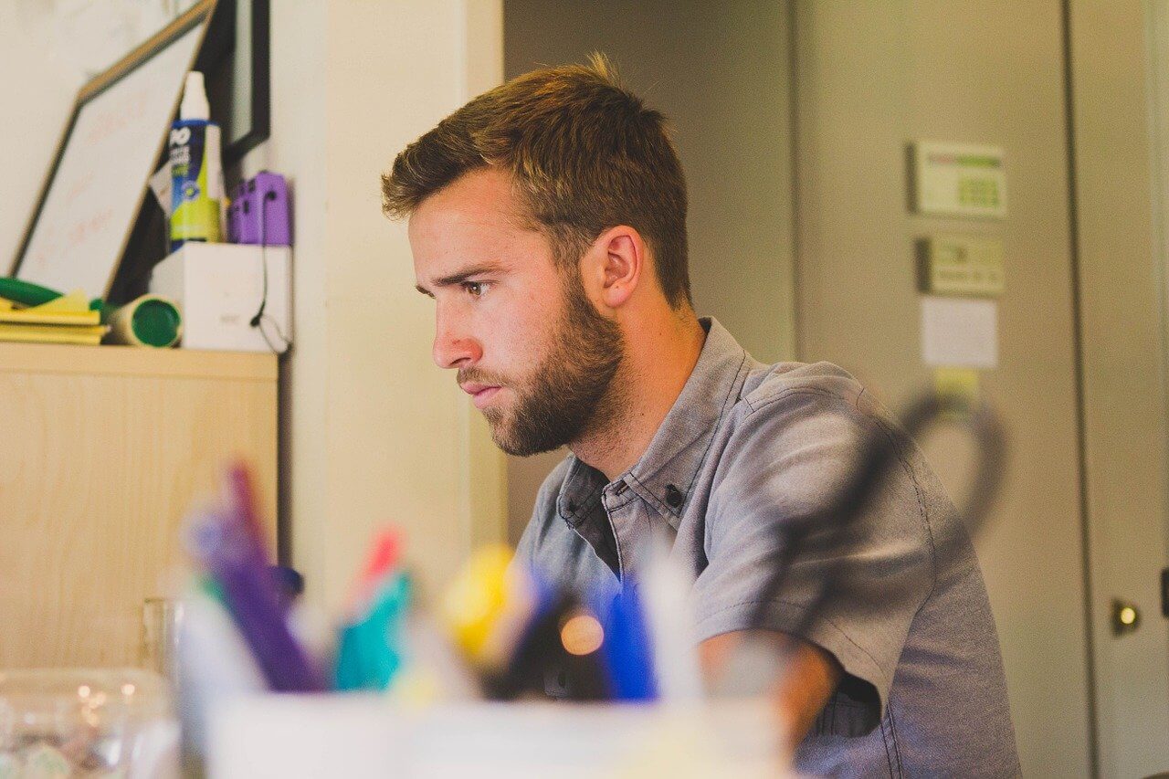 man working at desk