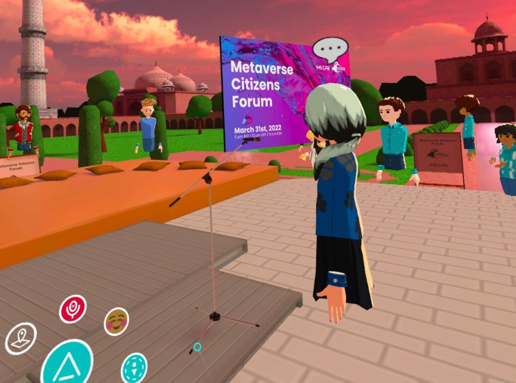 A participant in an AltspaceVR event stands at a virtual microphone to ask the panelists a question.
