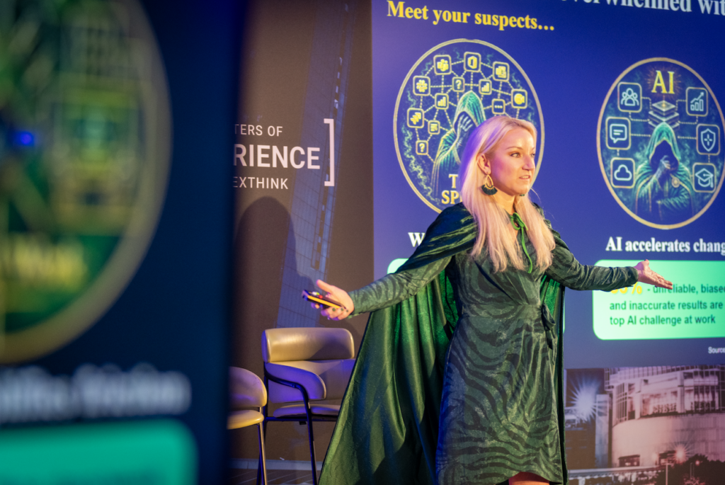 Photo of Christy Punch presenting on stage at Nexthink event